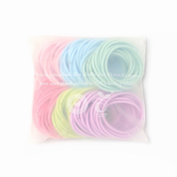 Hair bobbles in cornstarch bag