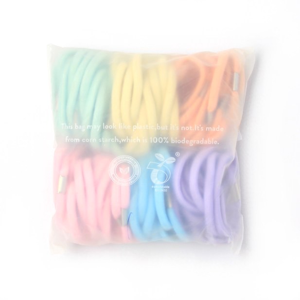 Hair elastics in cornstarch biodegradable bag