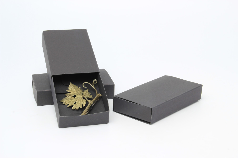 Black matchbox style jewellery box for brooches