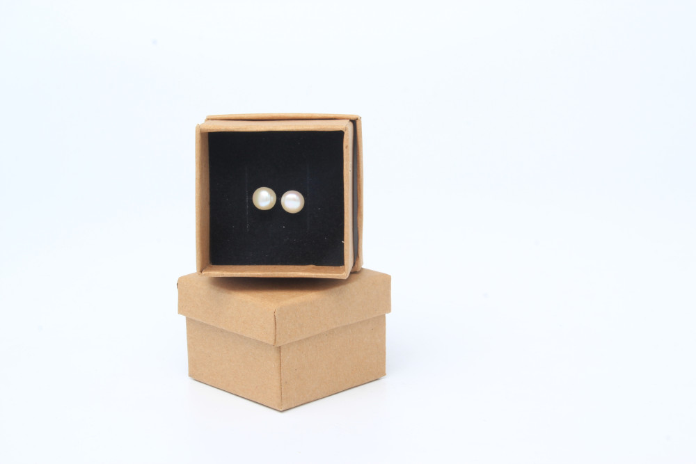 Pearl earrings in brown kraft earring box