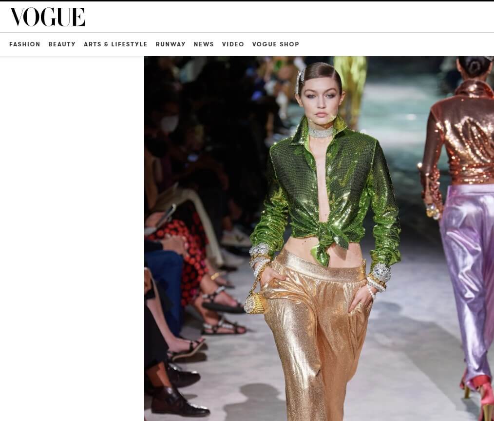 Tom Ford catwalk ss22 - Gigi Hadid in sequin luxe sportswear and crystal hair clips