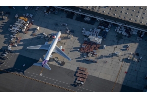 FedEx plane being loaded with cargo for international delivery