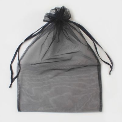 40x28cm. Black organza bag.