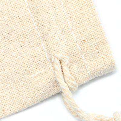10x8cm. Unbleached, raw cotton drawstring bag