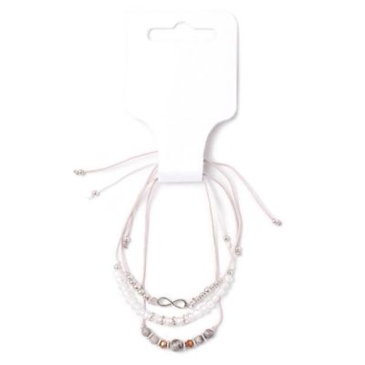 Card of 3 grey and white corded bracelets with beads and charms