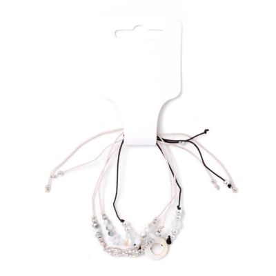 Card of 3 grey and black corded bracelets with stone chips and charms