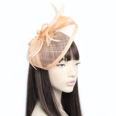 © Style Olivia. Sinamay hatinator on an aliceband