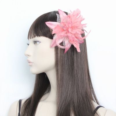 © Style Molly. Pink flower fascinator on a clear comb