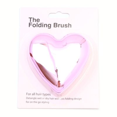 Folding heart shaped detangling brush