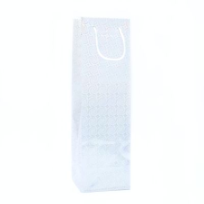 34x10x9cm. Silver holographic bottle bag