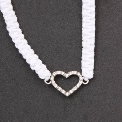 White corded bracelet with diamante heart charm
