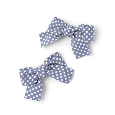 Polka dot fabric bows on a clip. 5cm