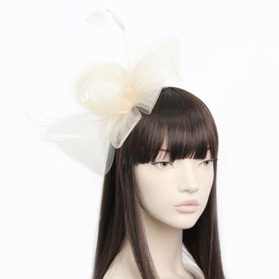 Style Jackie. Looped net fascinator on an aliceband