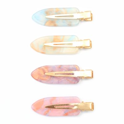 Creaseless setting clips in space acetate