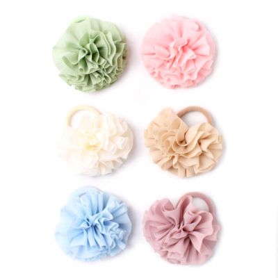 Large pom pom motif jersey elastic