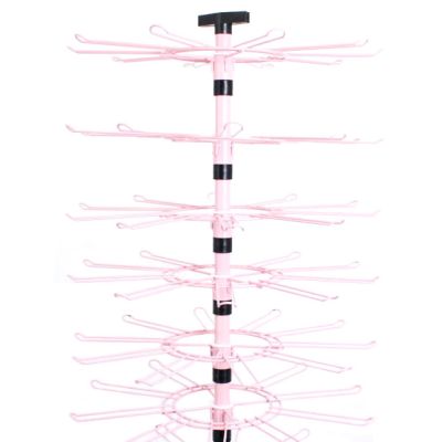 Pink revolving floor stand with adjustable spinners