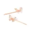 Card of 2 butterfly motif grips. 5.5cm