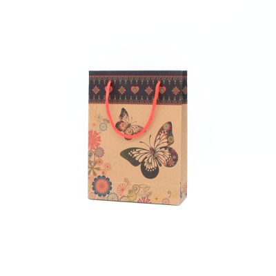 20x15x6cm. Floral butterfly print kraft gift bag