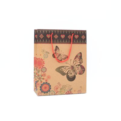 24x19x8cm. Floral butterfly print kraft gift bag