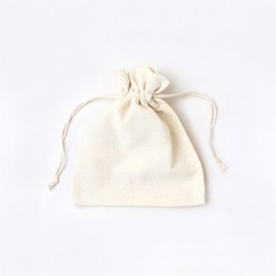 Size: 16 x 14 cm. unbleached, raw cotton drawstring bag.