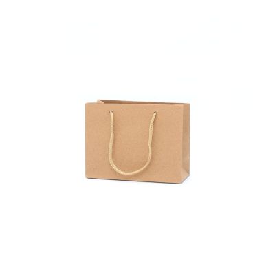 11x14.5x6cm. Brown kraft paper gift bag