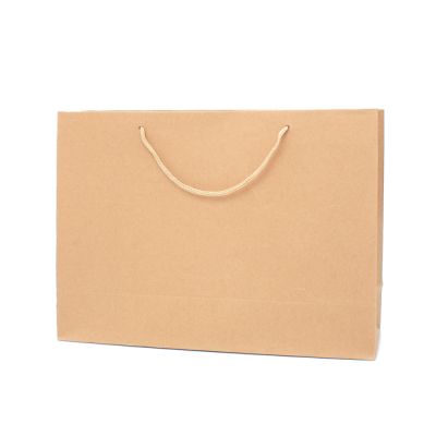 24x33x10.5cm. Brown kraft paper gift bag