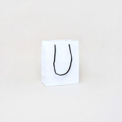 15x12x6cm. White gift bag with black handles