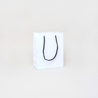 15x12x6cm. White gift bag with black handles