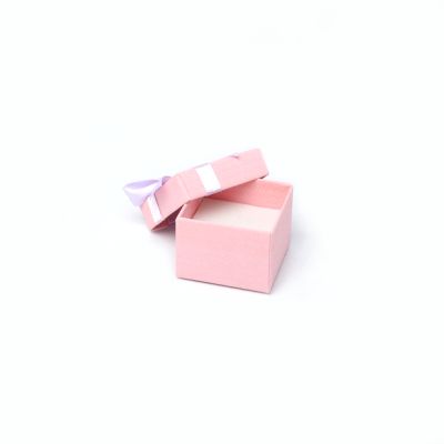 Ring box. 5x5x3.5cm. Pink gift box with lilac bow.