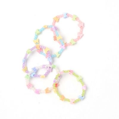 Card of 5 frosted bead and butterfly stretch bracelets