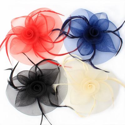 © Style Josie. mesh fascinator on a clip and brooch pin