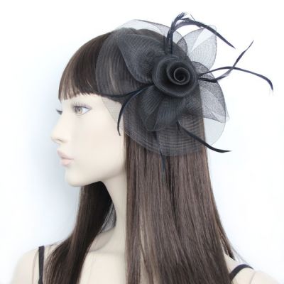 © Style Josie. mesh fascinator on a clip and brooch pin