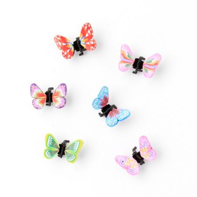 Card of 4 fimo butterfly mini clamps. 1cm