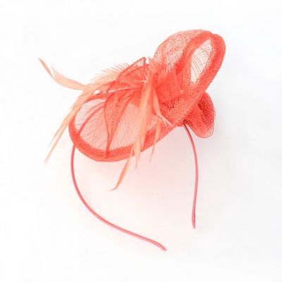 © Style Eliza. Coral curled fascinator on an aliceband
