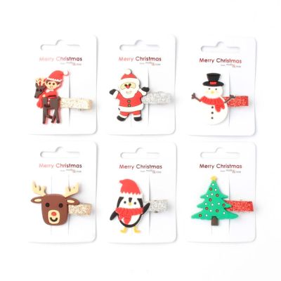 Clip strip of assorted Christmas character beak clips 3cm