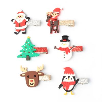 Clip strip of assorted Christmas character beak clips 3cm