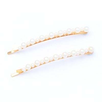 Gilt plated pearl bead grips. 8.5cm