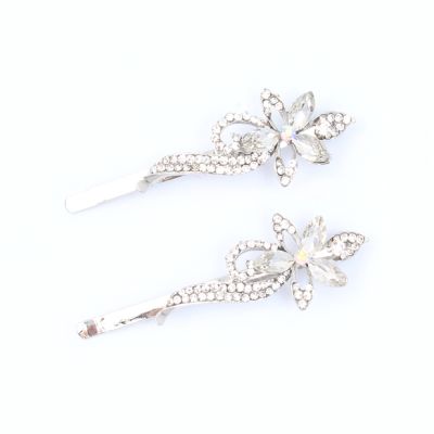 Card of 2 floral design crystal stone grips. 6cm