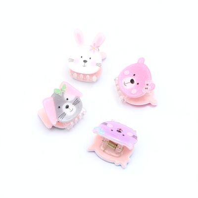 Card of 2 animal face child size clamps. 1.5cm