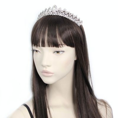 Crystal graduated design tiara in silver plate.