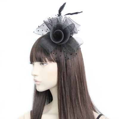 Style Caroline. Black net rosette fascinator on an aliceband