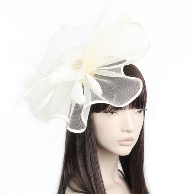 Style Sally. Cream waved net and feather fascinator