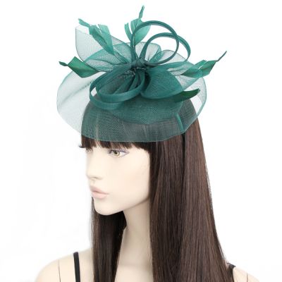 Style Sophia. Sinamay cap fascinator with net and feathers