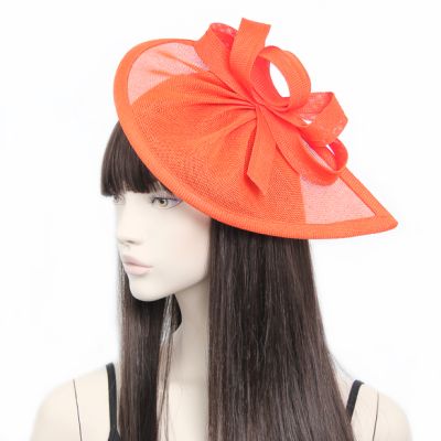 Style Lily. Orange Pointed Sinamay Fascinator with Loops