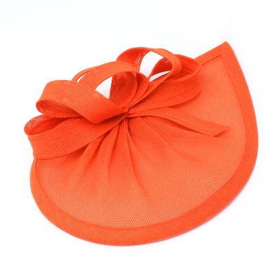 Style Lily. Orange pointed sinamay fascinator with loops