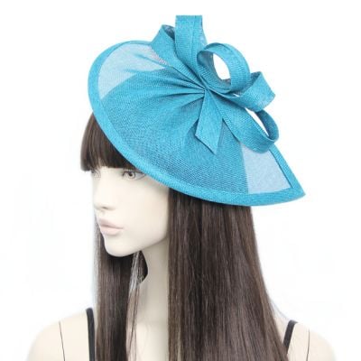 Style Lily. Teal Pointed Sinamay Fascinator with Loops