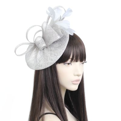 Style Charlotte. Silver sinamay fascinator