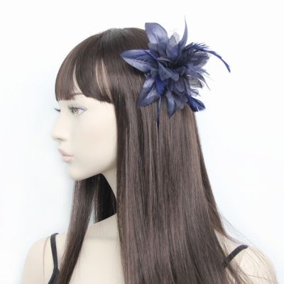 © Style Molly. Navy feather fascinator on a clear comb