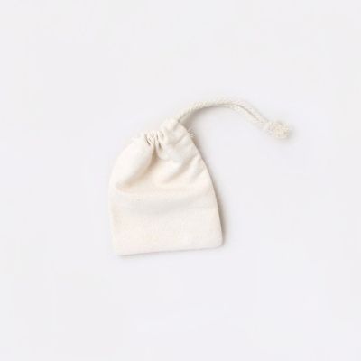 10x8cm. Ivory cotton canvas drawstring bag