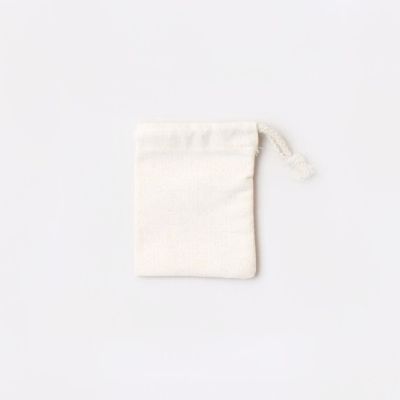 10x8cm. Ivory cotton canvas drawstring bag